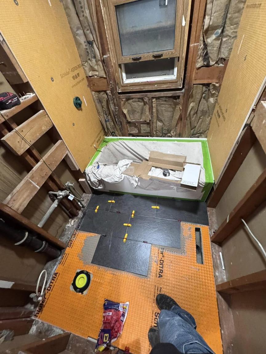 Waterproofing membrane and backer board installed