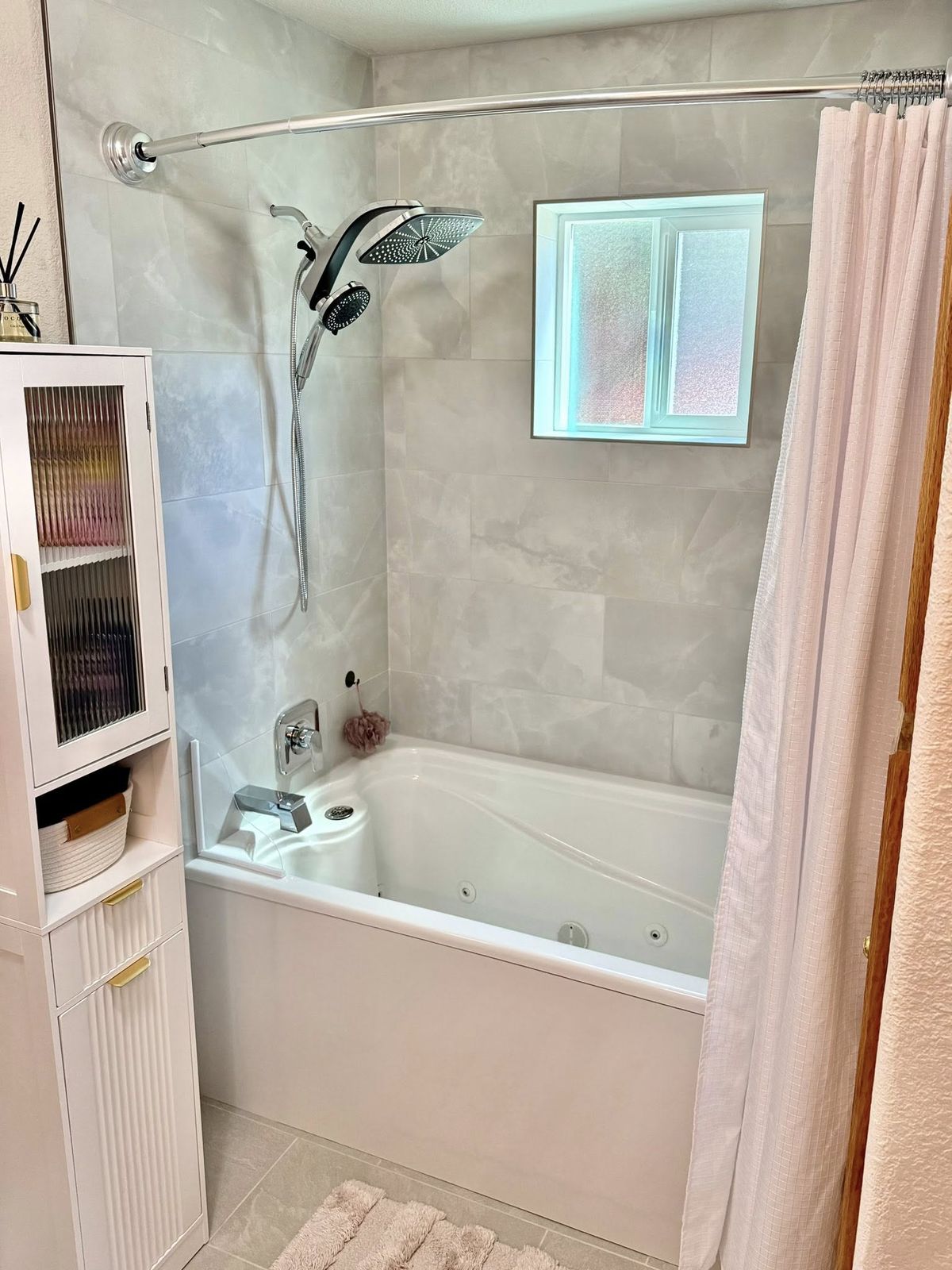 Jetted soaking tub with a tiled surround