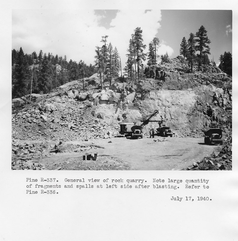 Rock quarry at the Vallecito Dam site, with fragments from blasting piled at left
